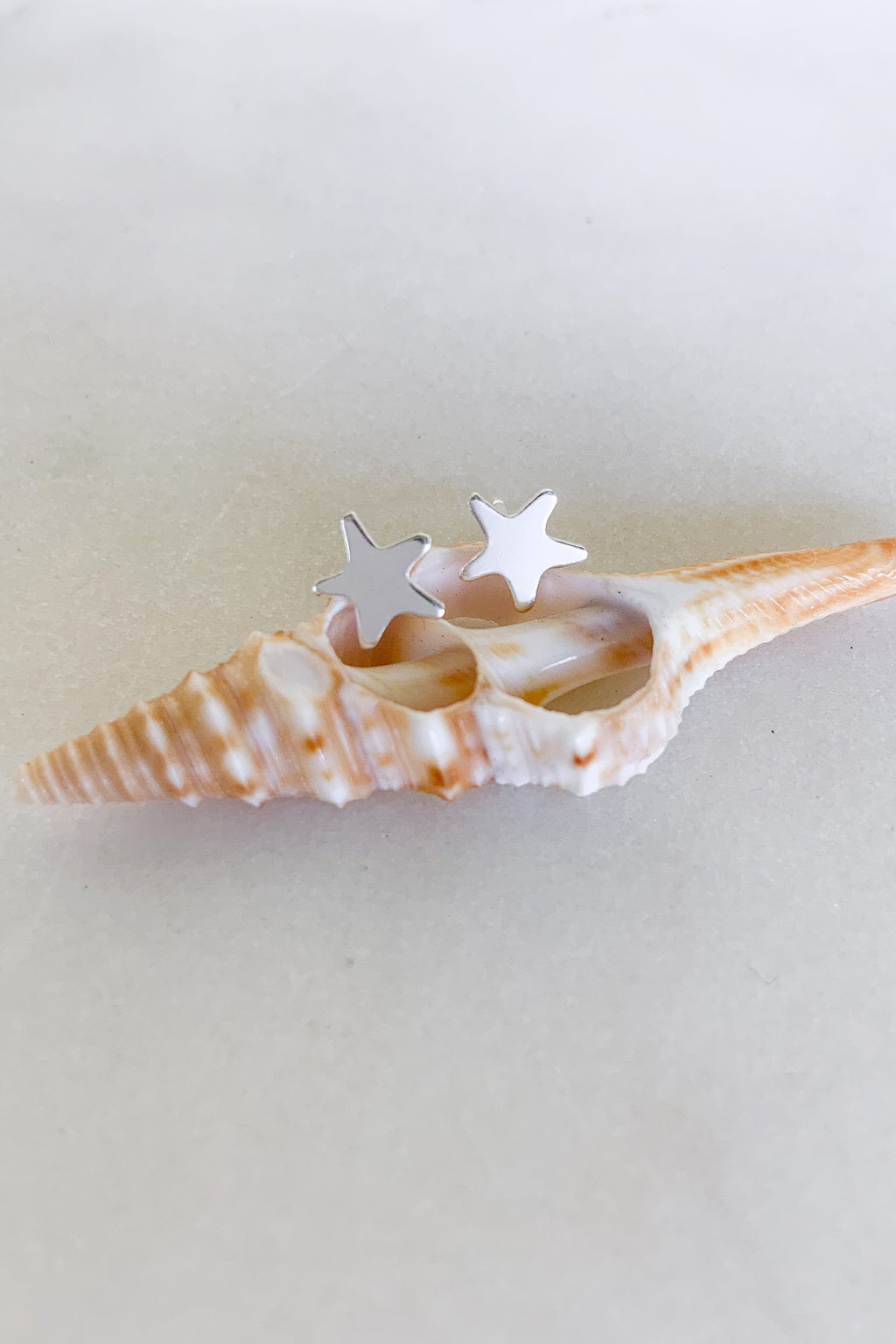 Tiny Star Stud - Sterling Silver